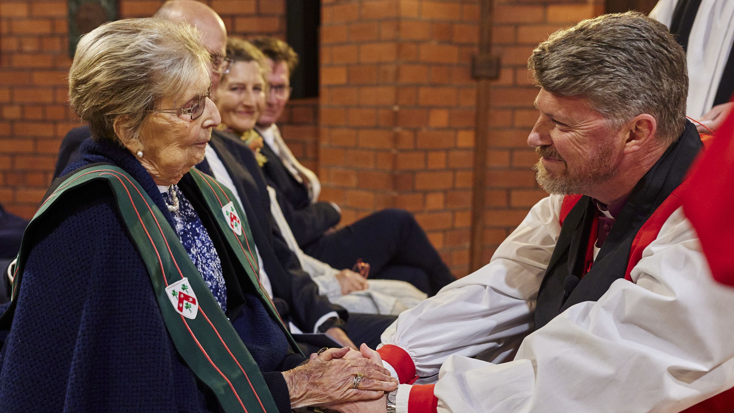 Bishop Richard Treloar congratulates Leith Hancock, 2022