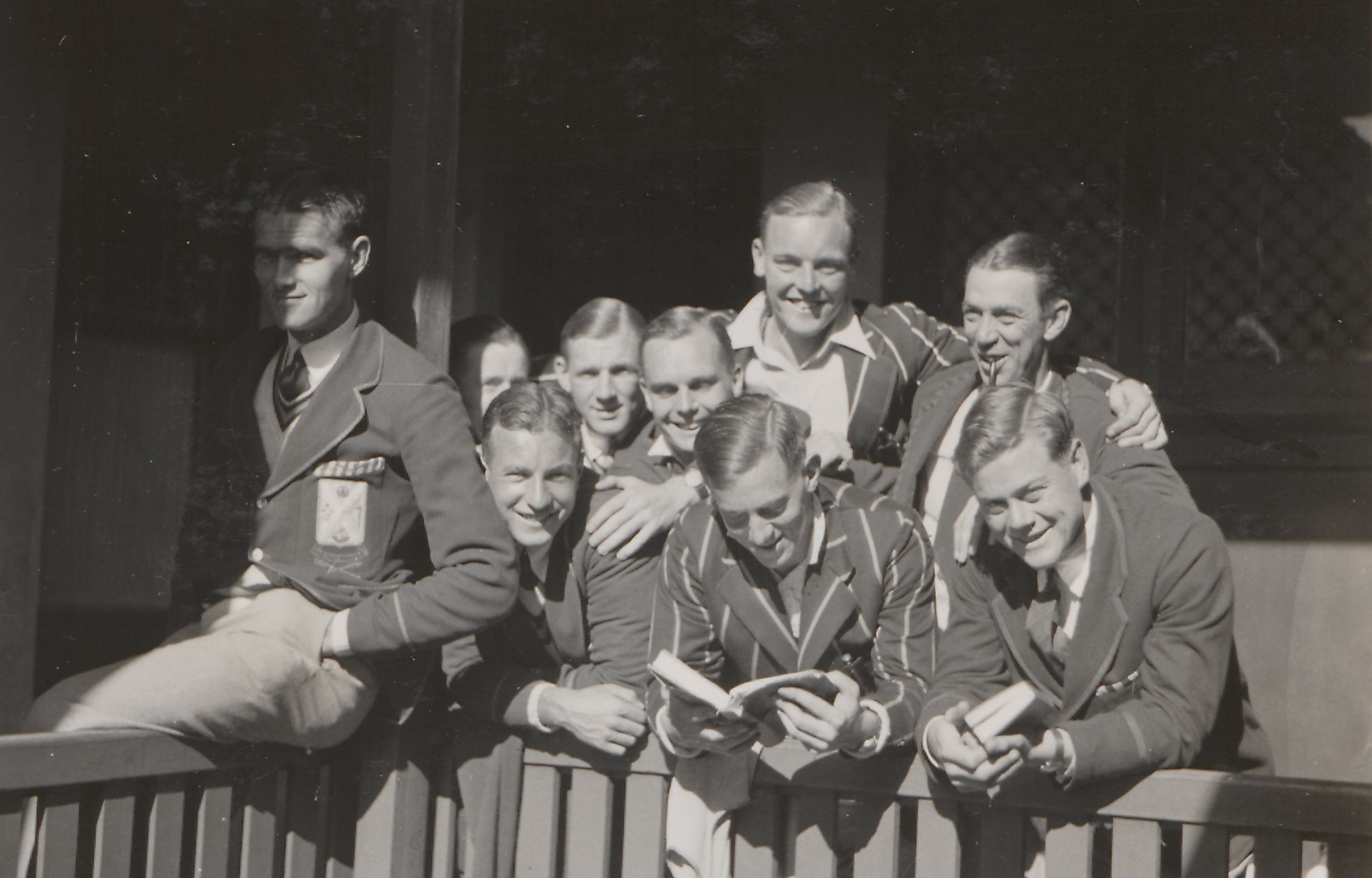 Group of male students wearing school and college-striped blazers, early 1930s.