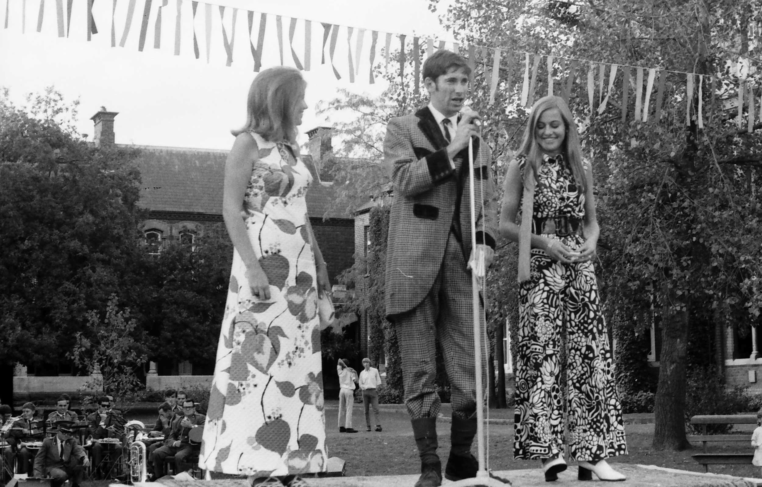 Two female students with the Senior Student at Trinity College, c.1968.